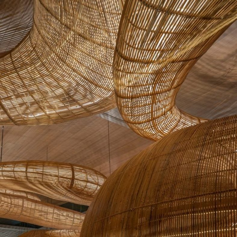 Rattan installation meanders through Thai art gallery by Enter Projects Asia