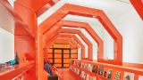 Gary Card redesigns LN-CC store with orange tunnel and LED-lit club